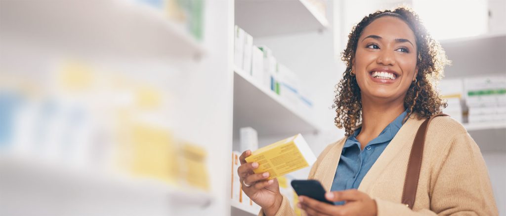 Woman shopping at a pharmacy who is happy with her HSA administrator and HSA provider.